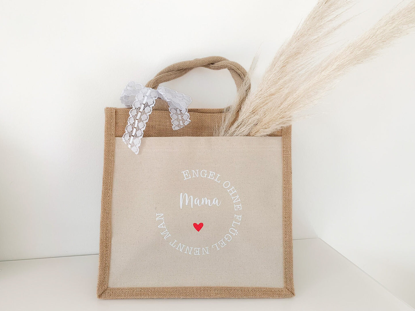 Jutetasche mit Spruch „Engel ohne Flügel nennen man Mama“